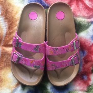 Pink and tan flip-flops